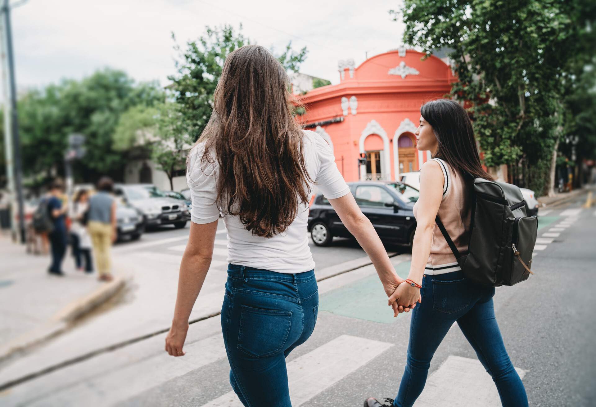 Young adult couple walking together in the city. Buenos Aires, Palermo District.